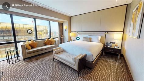 How much does it cost to stay at City of Dreams NÜWA Manila .